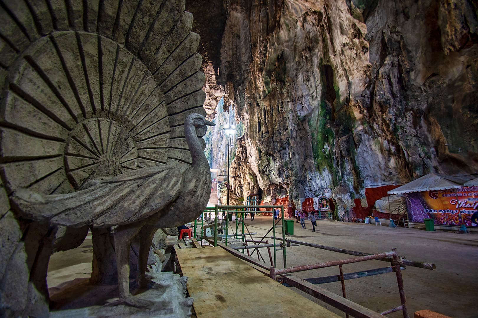 The rainbow staircase and golden statue at Batu Caves, Malaysia