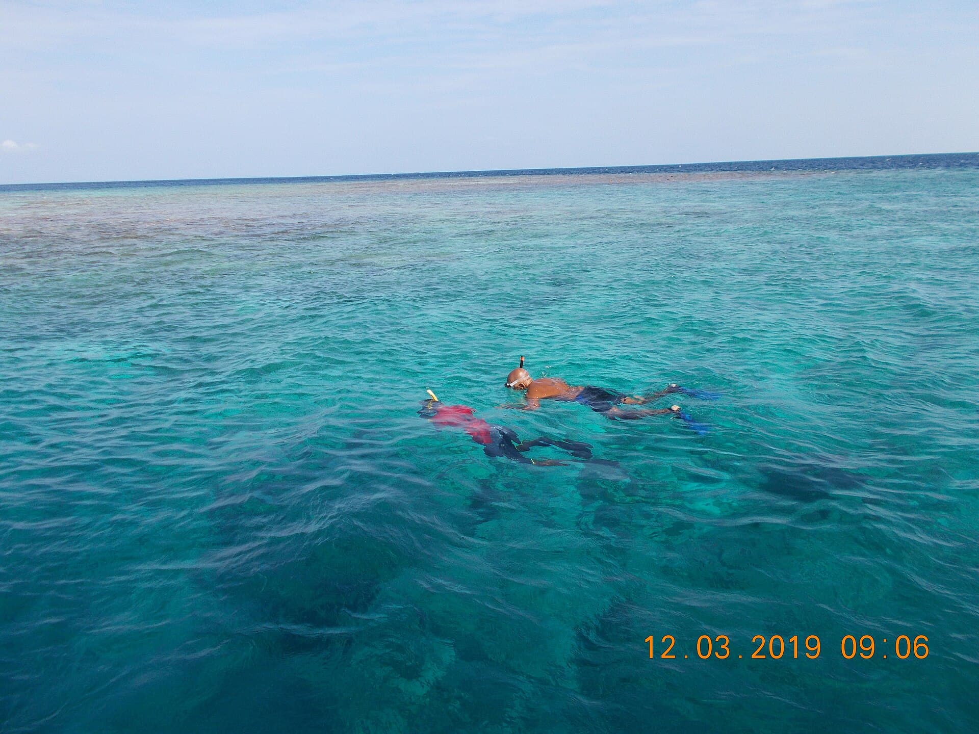 Snorkelling over a coral reef in the Maldives