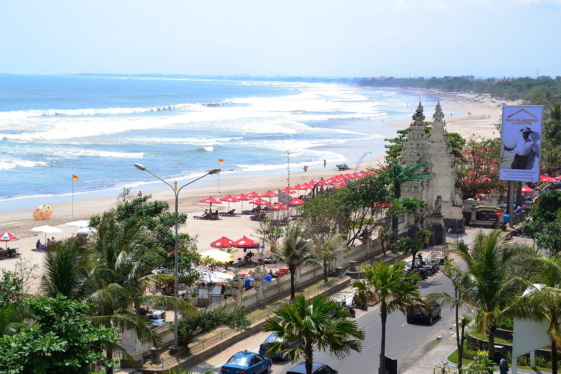 Surfers on Kuta Beach in Bali’s dry season