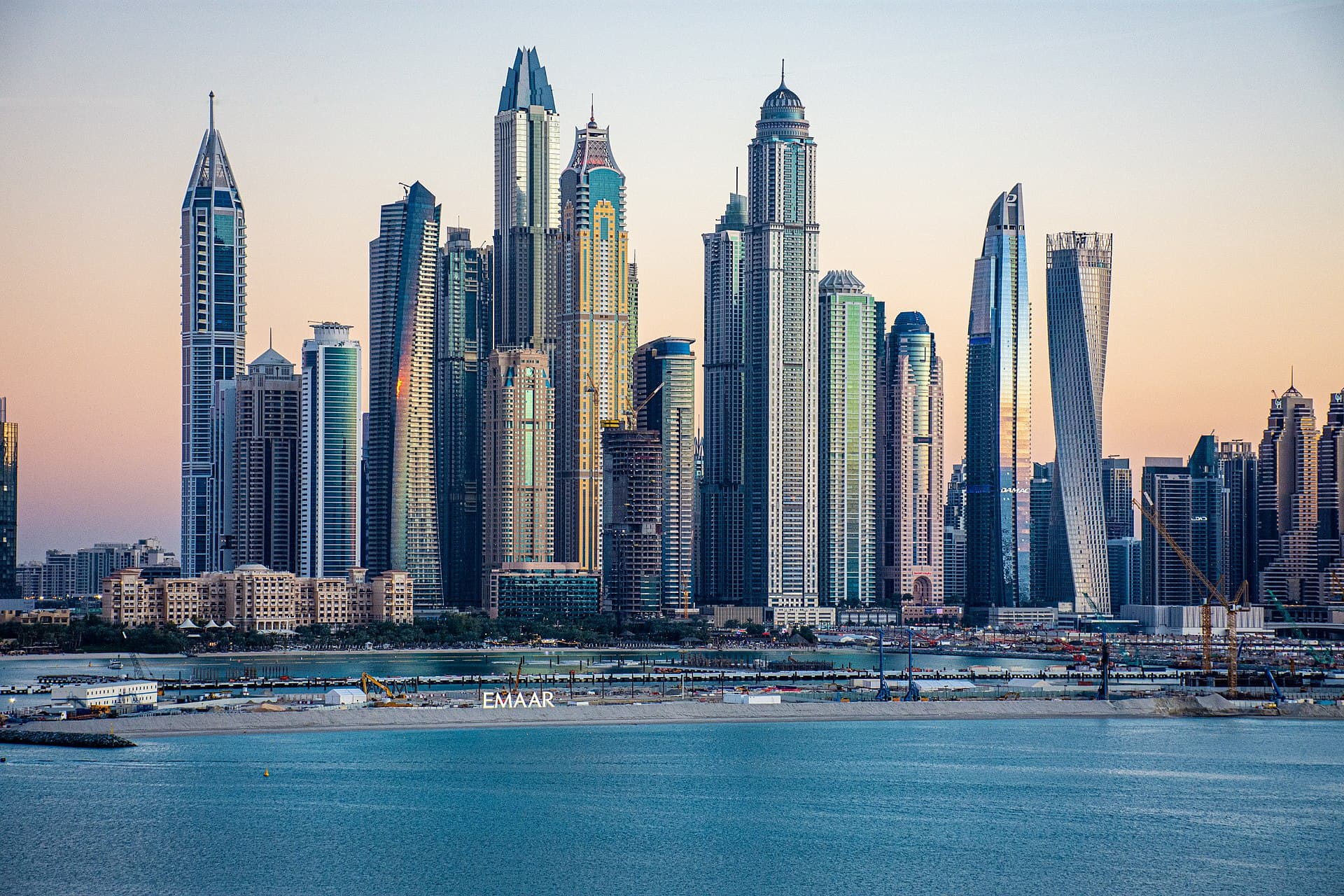 The Dubai Marina skyline glowing at dusk